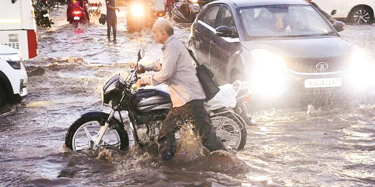 Weighty downpour handicaps life in Gujarat; seven people were swept away